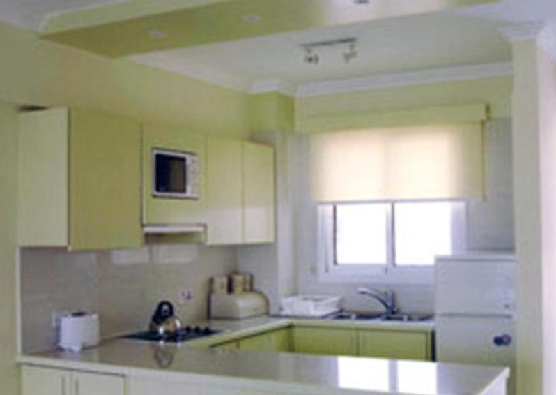 Paphinia Seaview Apartments Пафос Стая снимка